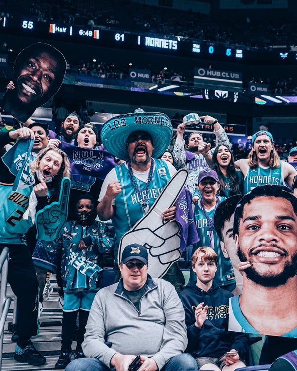 Crown Club members cheering at Spectrum Center