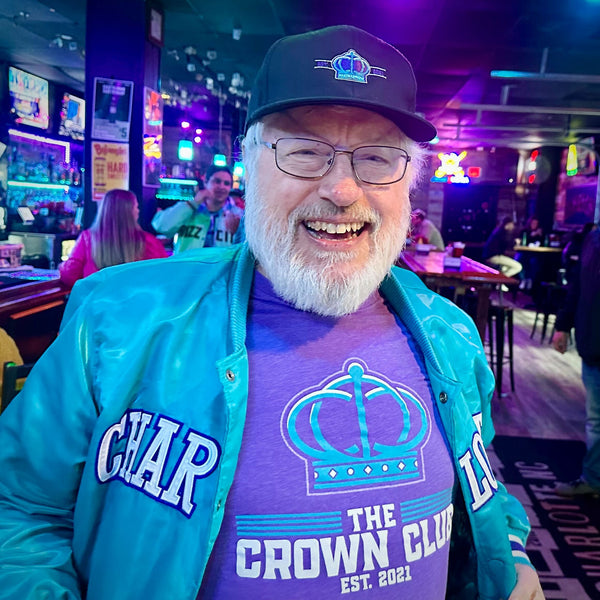 A Crown Club member in the crown shirt